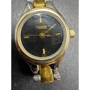 Caravelle By Bulova Womens Watch Gold and Silver Tone With Black Dial Working